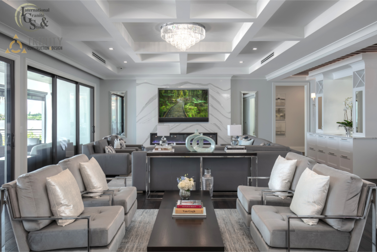 Cambria Brittanica Kitchen Countertops Bathroom Countertops White and Gray Quartz Countertops White Cabinets Kitchen Island marble looking quartz International Granite and Stone Trinity Construction and Design Collaboration gray furniture gray flooring white tile white backsplash