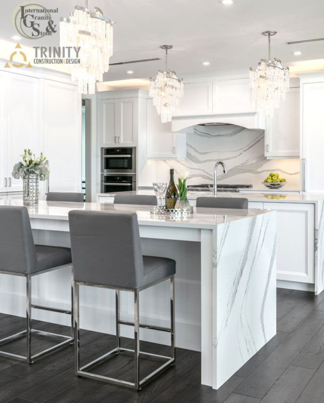 Cambria Brittanicca Kitchen Countertops White and Gray Quartz Countertops White Cabinets Kitchen Island marble looking quartz International Granite and Stone Trinity Construction and Design Collaboration gray furniture gray flooring white tile backsplash