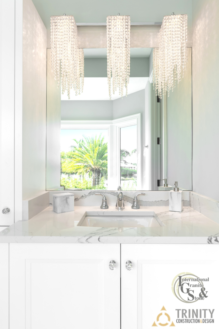 Cambria Brittanica Kitchen Countertops Bathroom Countertops White and Gray Quartz Countertops White Cabinets Kitchen Island marble looking quartz International Granite and Stone Trinity Construction and Design Collaboration gray furniture gray flooring white tile white backsplash