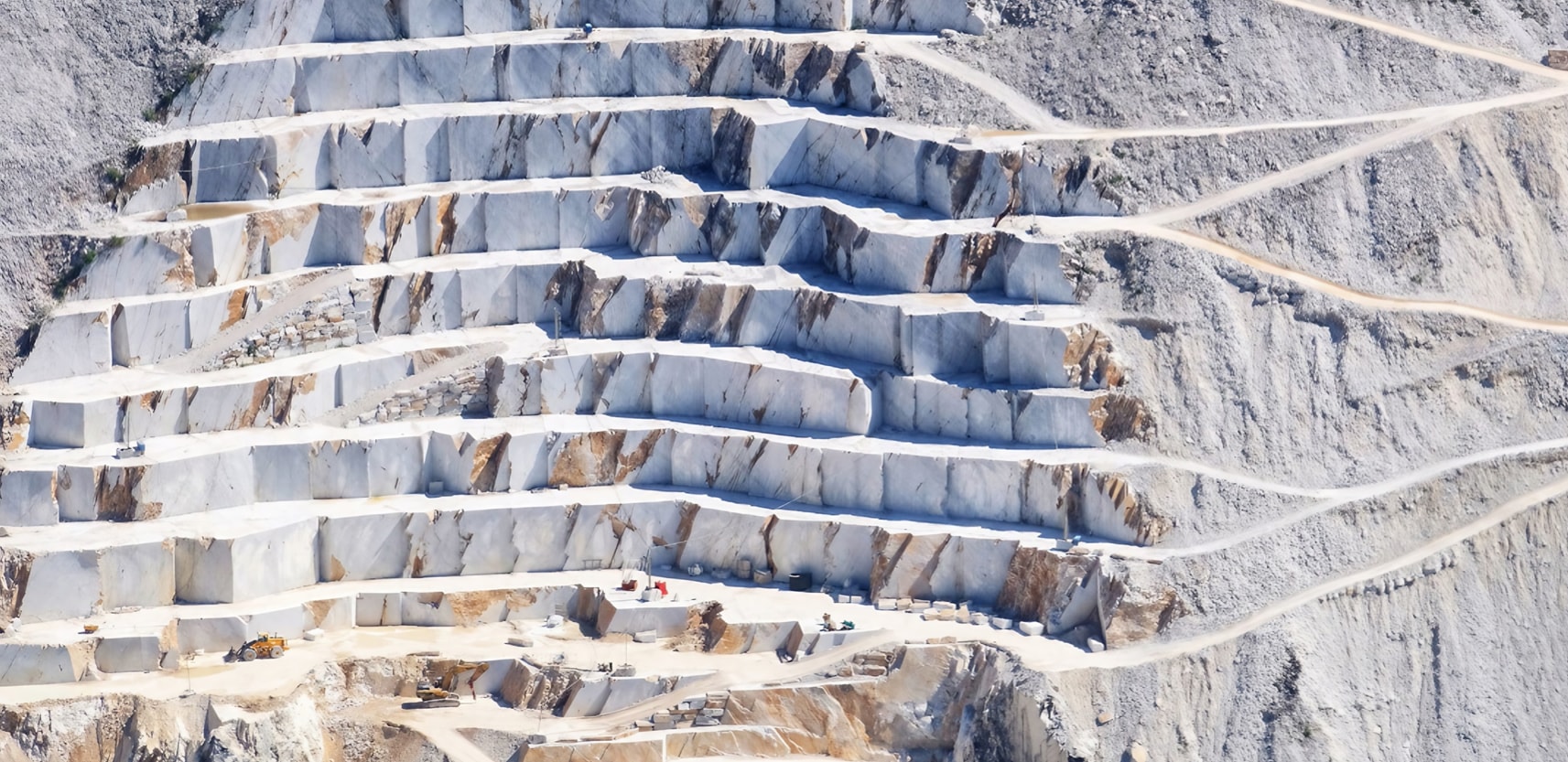 The Calacatta Marble Quarries in Italy's Apuan Alps embody the convergence of natural beauty and artistic expression. Renowned for producing luxurious Calacatta marble, these quarries showcase its distinctive appearance and rarity. Amidst the towering peaks, skilled extraction reveals a canvas of geological art, each slab telling a story spanning millennia. The marble serves as inspiration for architectural masterpieces and artworks worldwide. A blend of tradition and innovation, these quarries echo with nature's beauty and human dedication, symbolizing opulence and taste. They celebrate the intricate interplay between Earth's treasures and human creativity, encapsulating elegance and enduring artistic connection.
